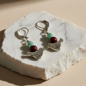 Song in Flight: Handmade Bird Charm Earrings with Glass Beads